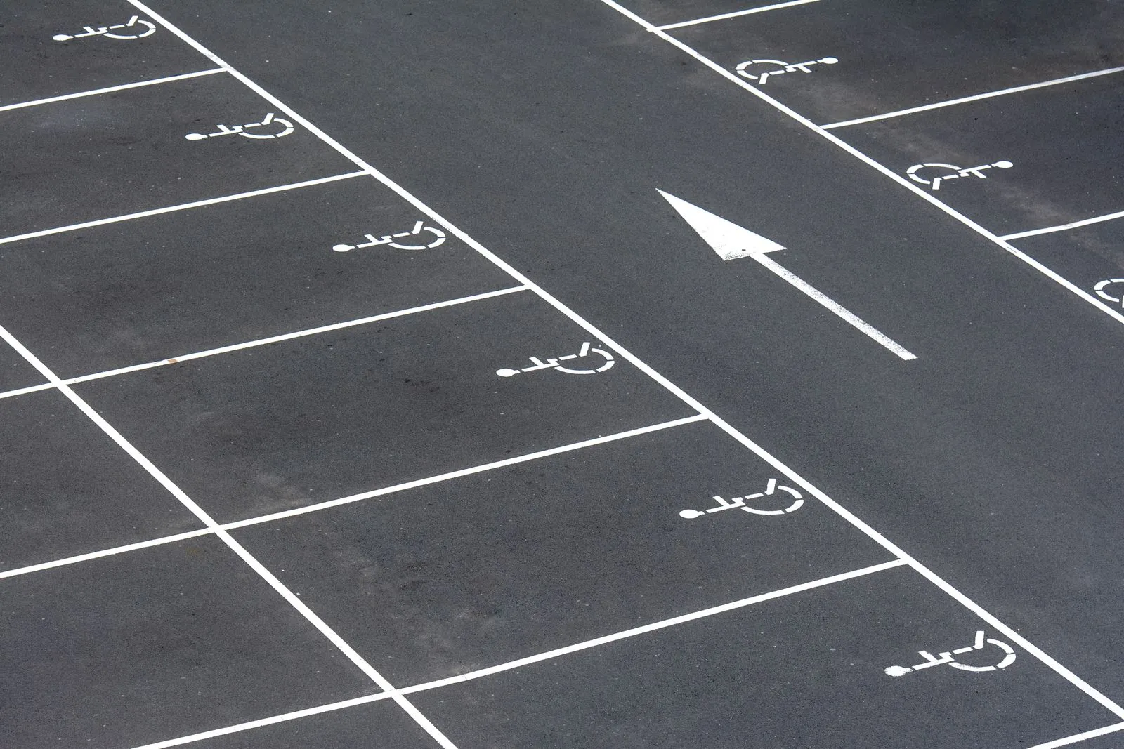 Asphalt parking surface prepared for pavement maintenance